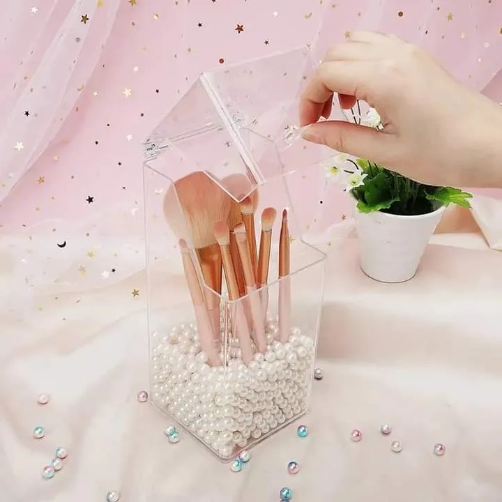 Transparent brush holder with pearls